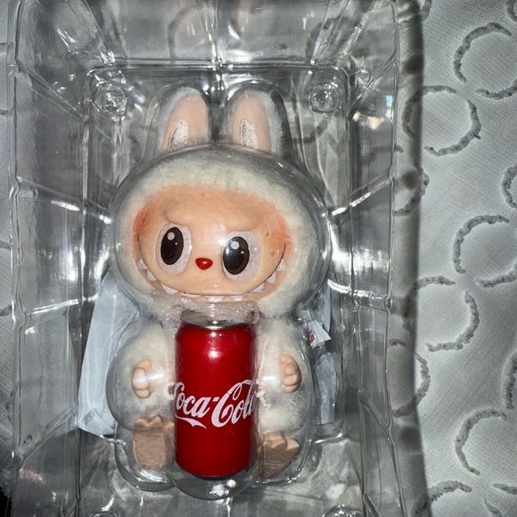Labubu coca cola never opened. Bought from pop mart directly.